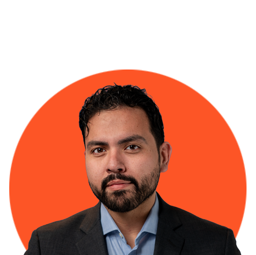 Professional headshot of Jonathan Albarran wearing a suit against an orange circle background